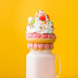 unicorn milkshake with colourful sprinkles